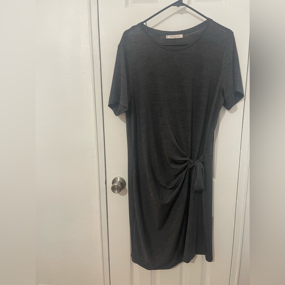 Metallic grey dress with faux wrap detailing.